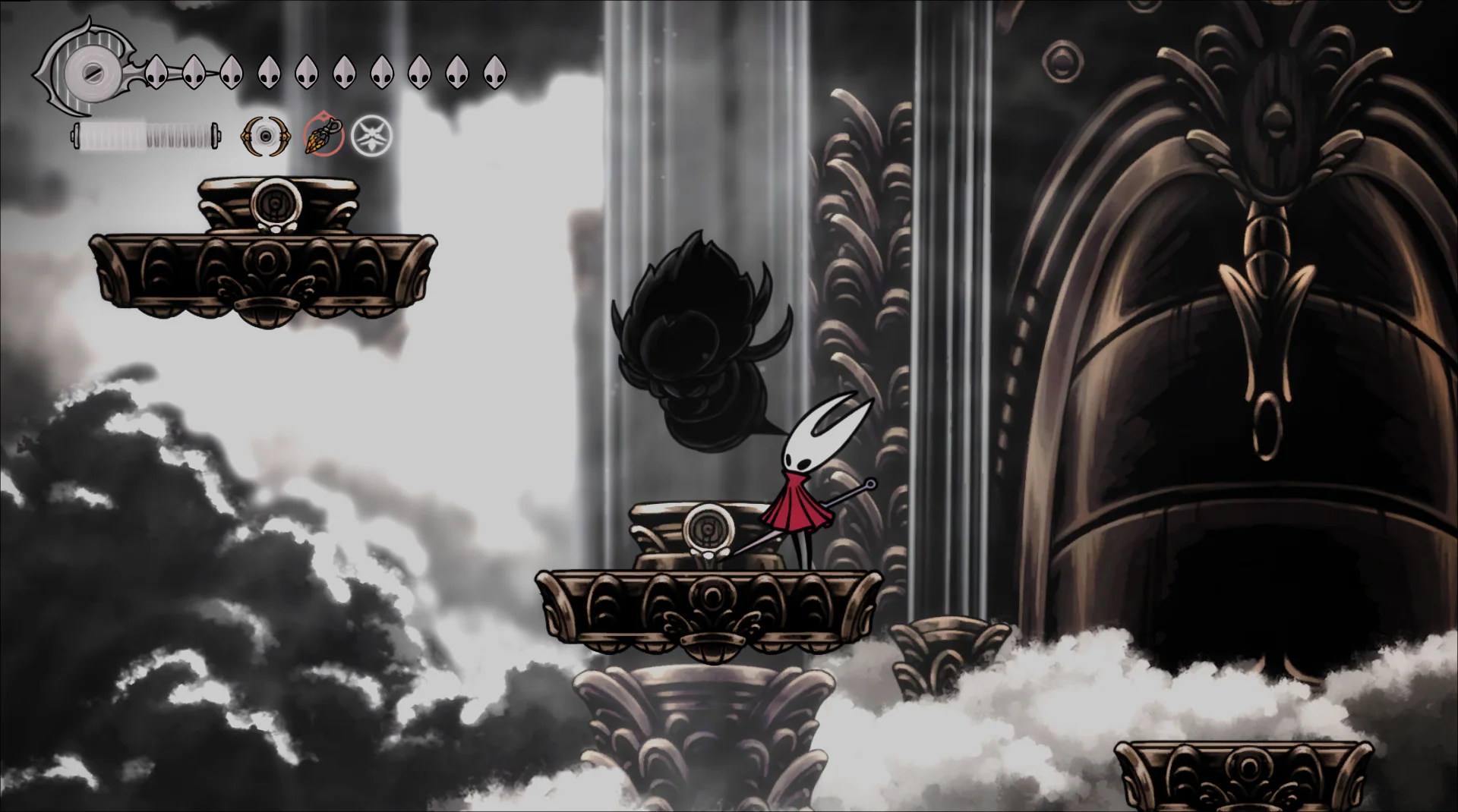 Hornet looking at a boss statue